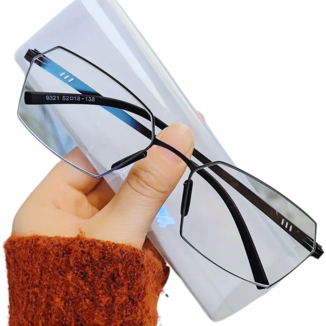 Executive wearing First Lens CEO Reading Glasses while working