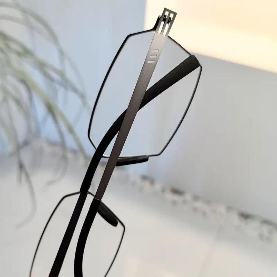 Close-up of First Lens CEO Reading Glasses on a desk