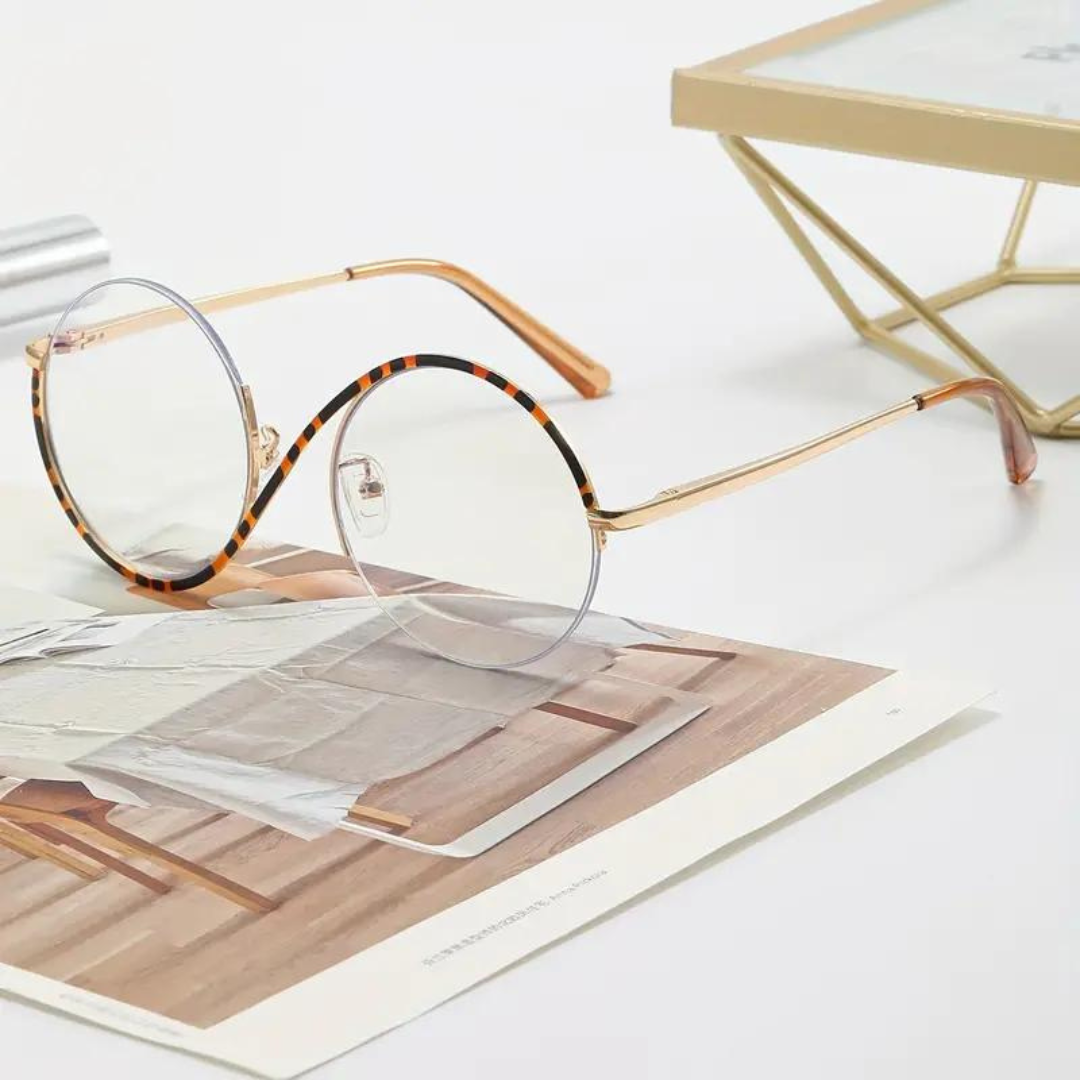 The First Lens Infinity Computer Glasses 002 with a fashionable leopard design, showcasing its stylish frames.