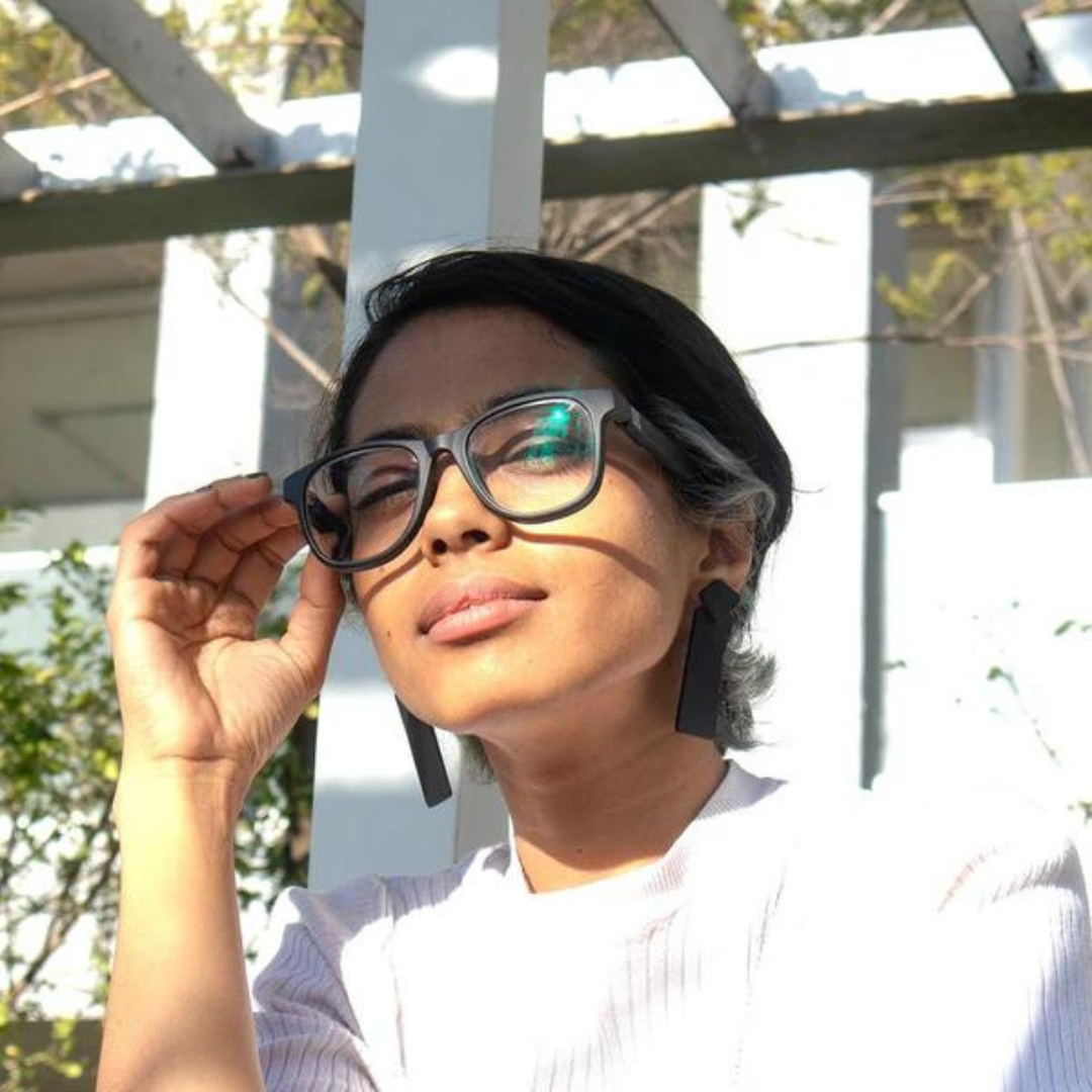 Side view of First Lens Catty glasses highlighting the absence of frames, providing a minimalist aesthetic suitable for all genders.