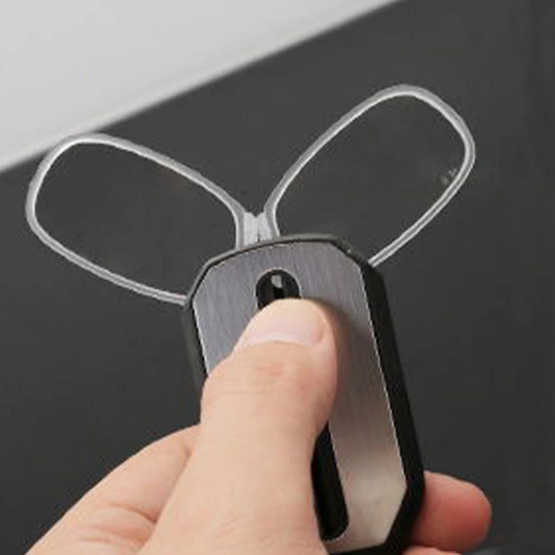 Person using First Lens Mini Nose Clip Reading Glasses for reading