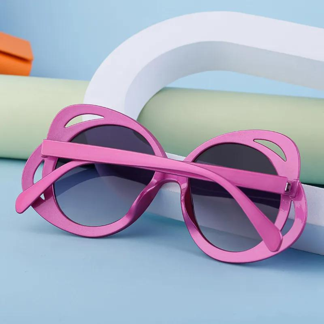 Fashionable red oversized sunglasses with round lenses