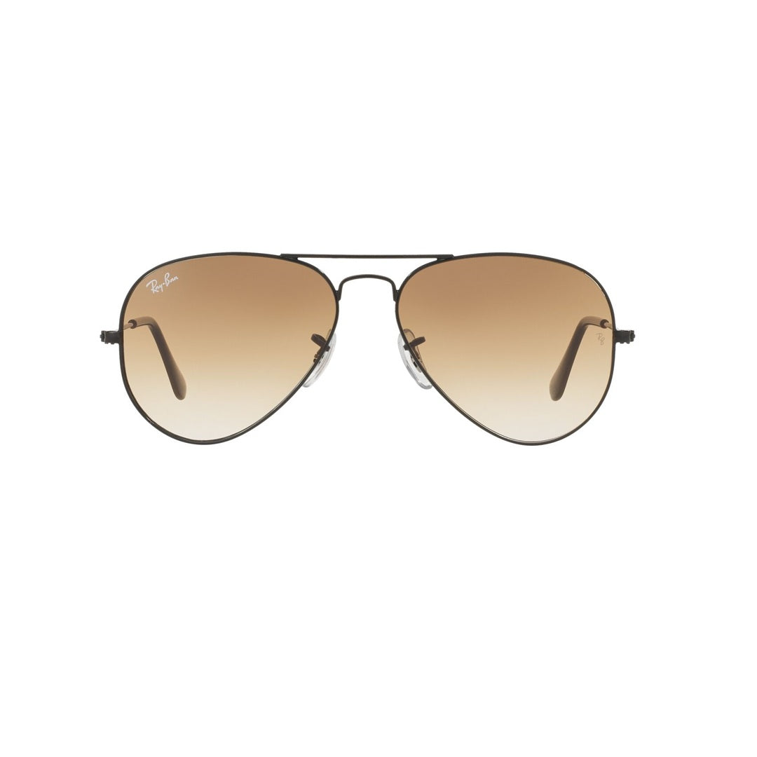 Ray-Ban Aviator 0Rb3025 sunglasses with blue to grey gradient polarized lenses and black metal frame.