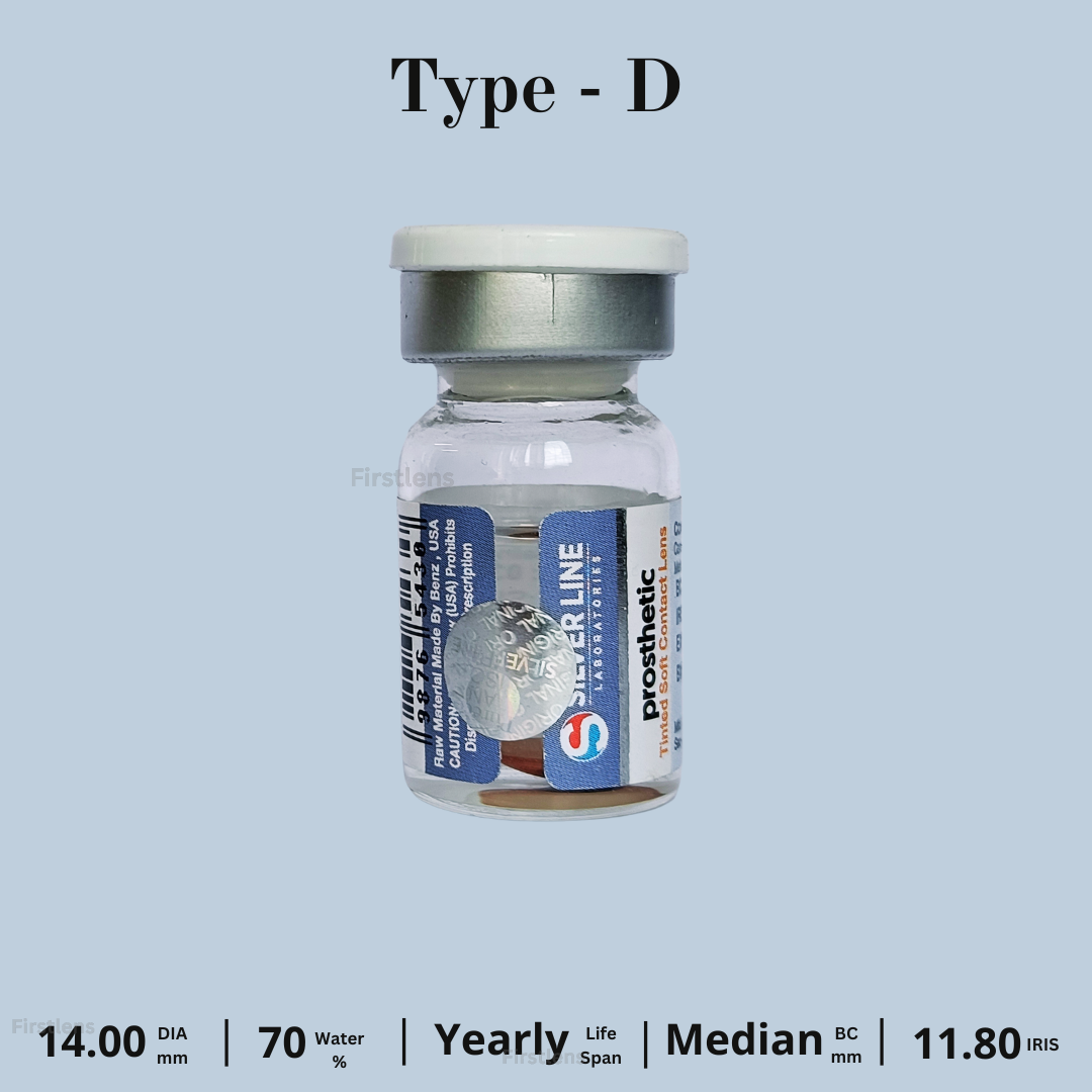 Image of Silverline Prosthetic D-Type contact lens held with tweezers, focusing on its durable design and uniform pigmentation suitable for concealing eye discolorations.