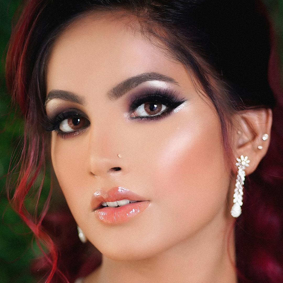 Natural dark brown eyes with Swati Bronze contacts