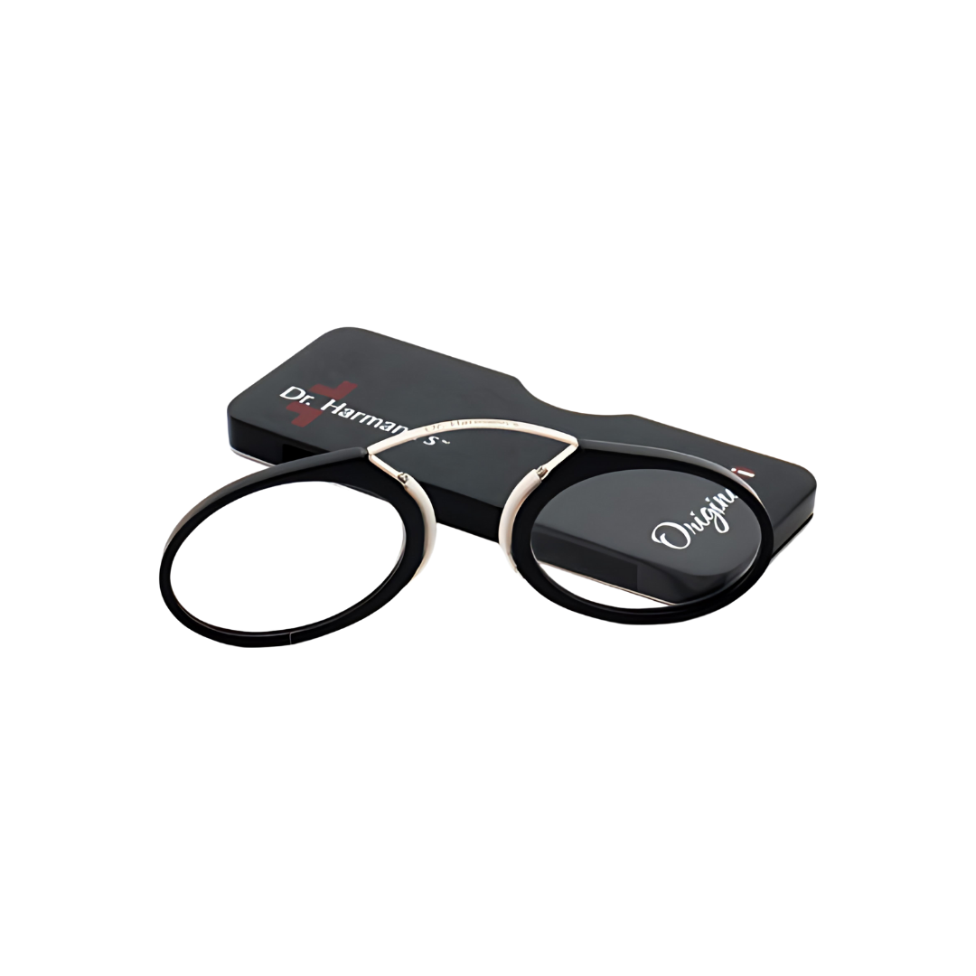 First Lens Dr. Harmanns reading glasses Originali on a bookshelf