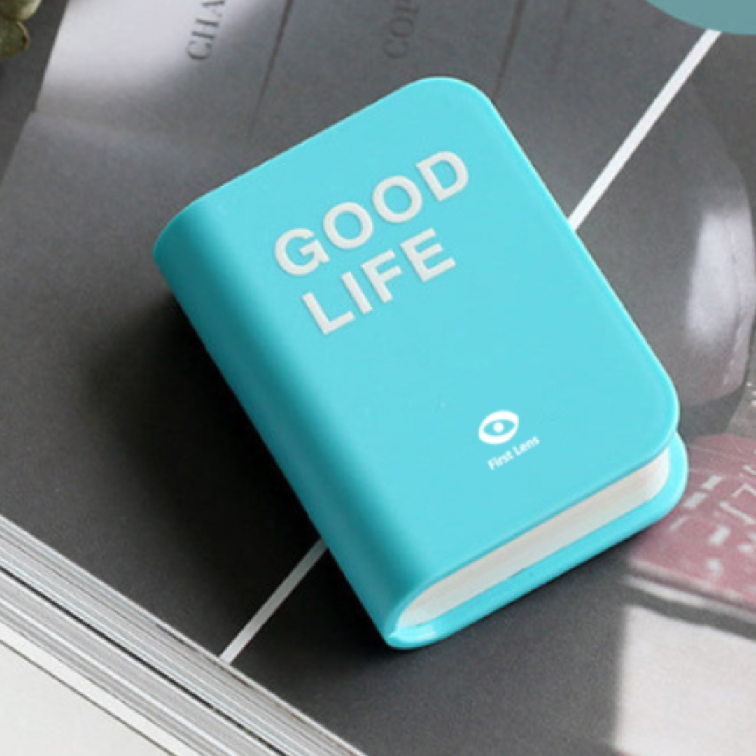 An innovative contact lens case that looks like a book, providing both practical storage and a decorative element.