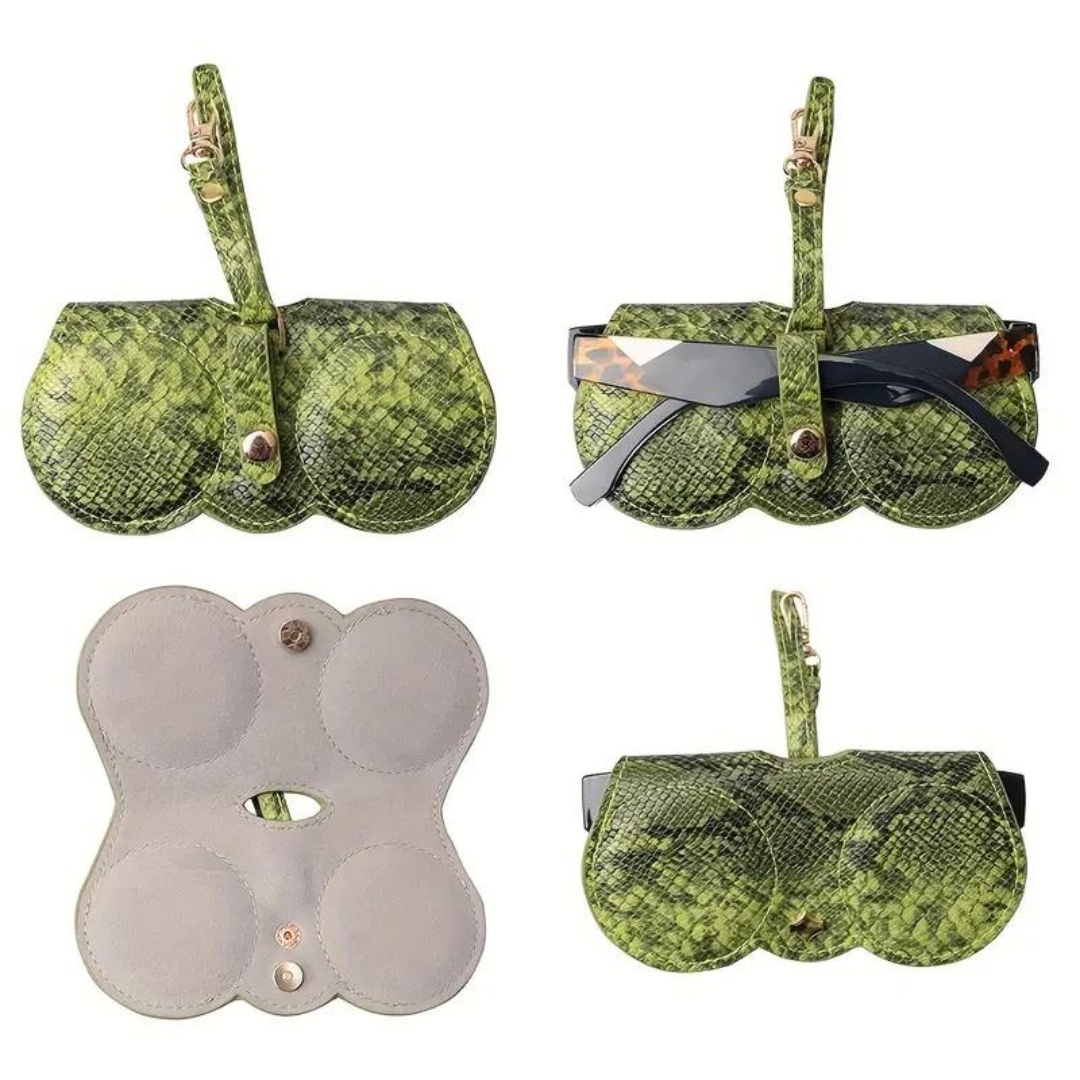 A traveler packing their First Lens sunglasses in the case for a trip.