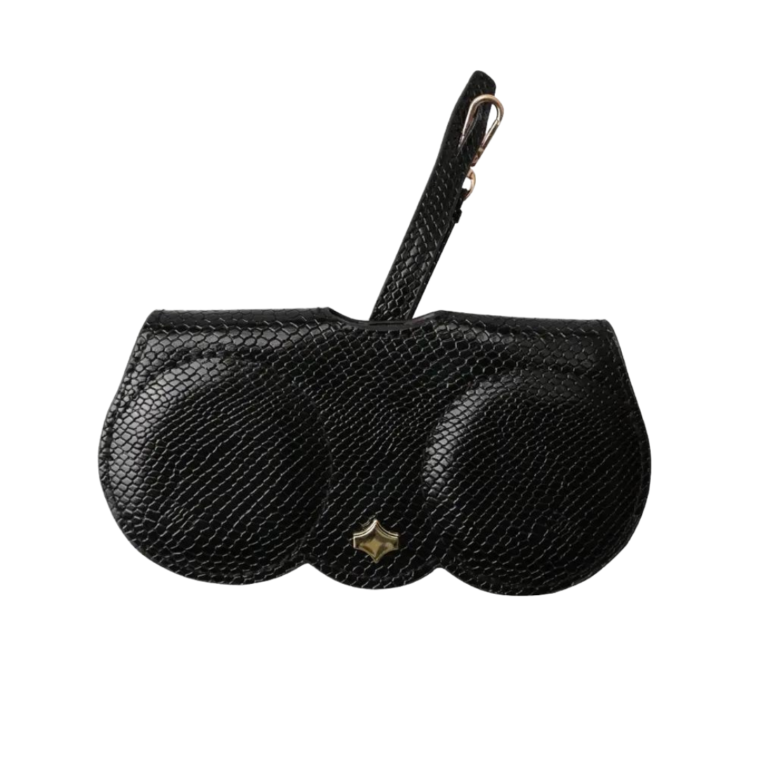 A male model holding the First Lens case, demonstrating its unisex design.