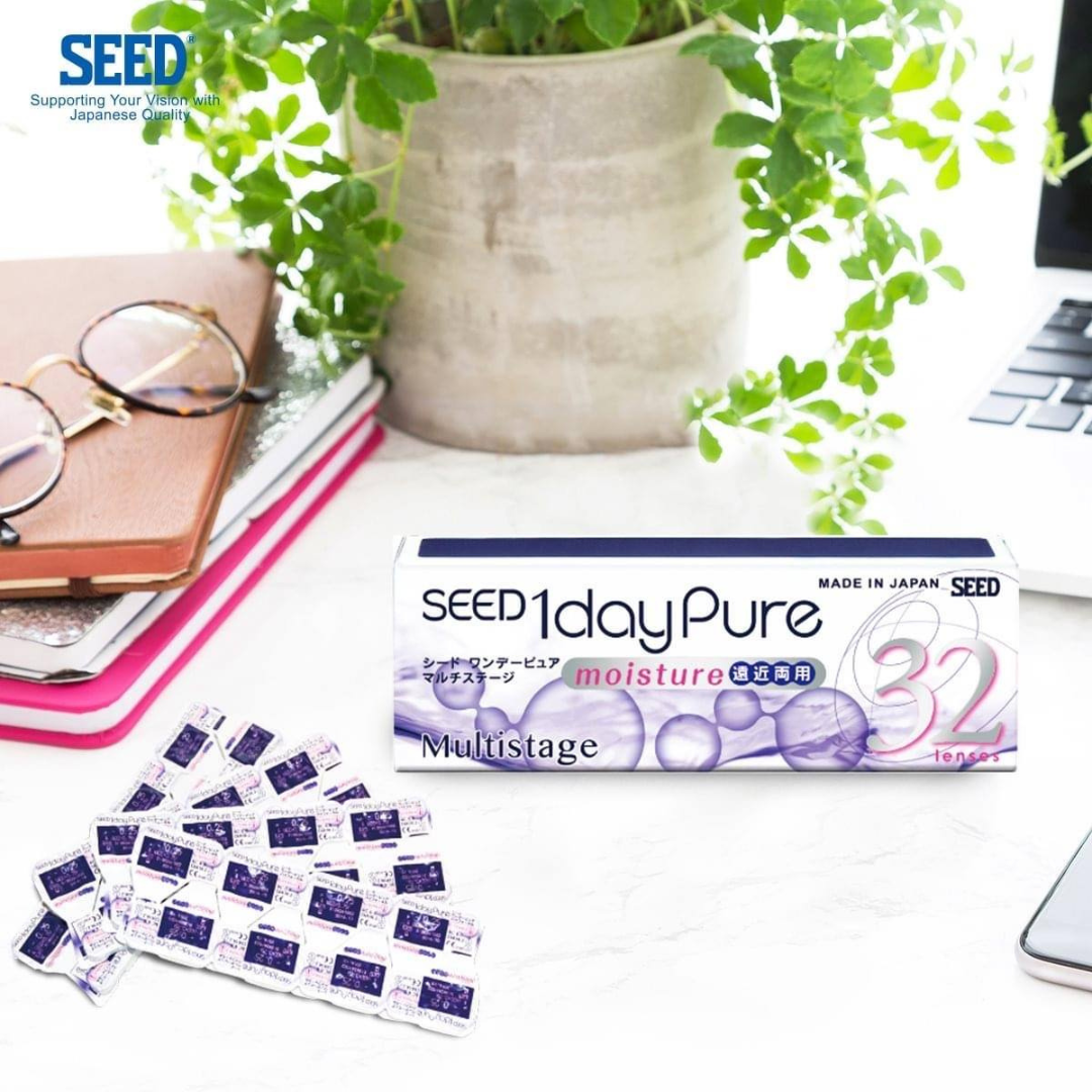 Close-up of the First Lens SEED 1-Day Pure Multifocals lenses in their eco-friendly packaging.