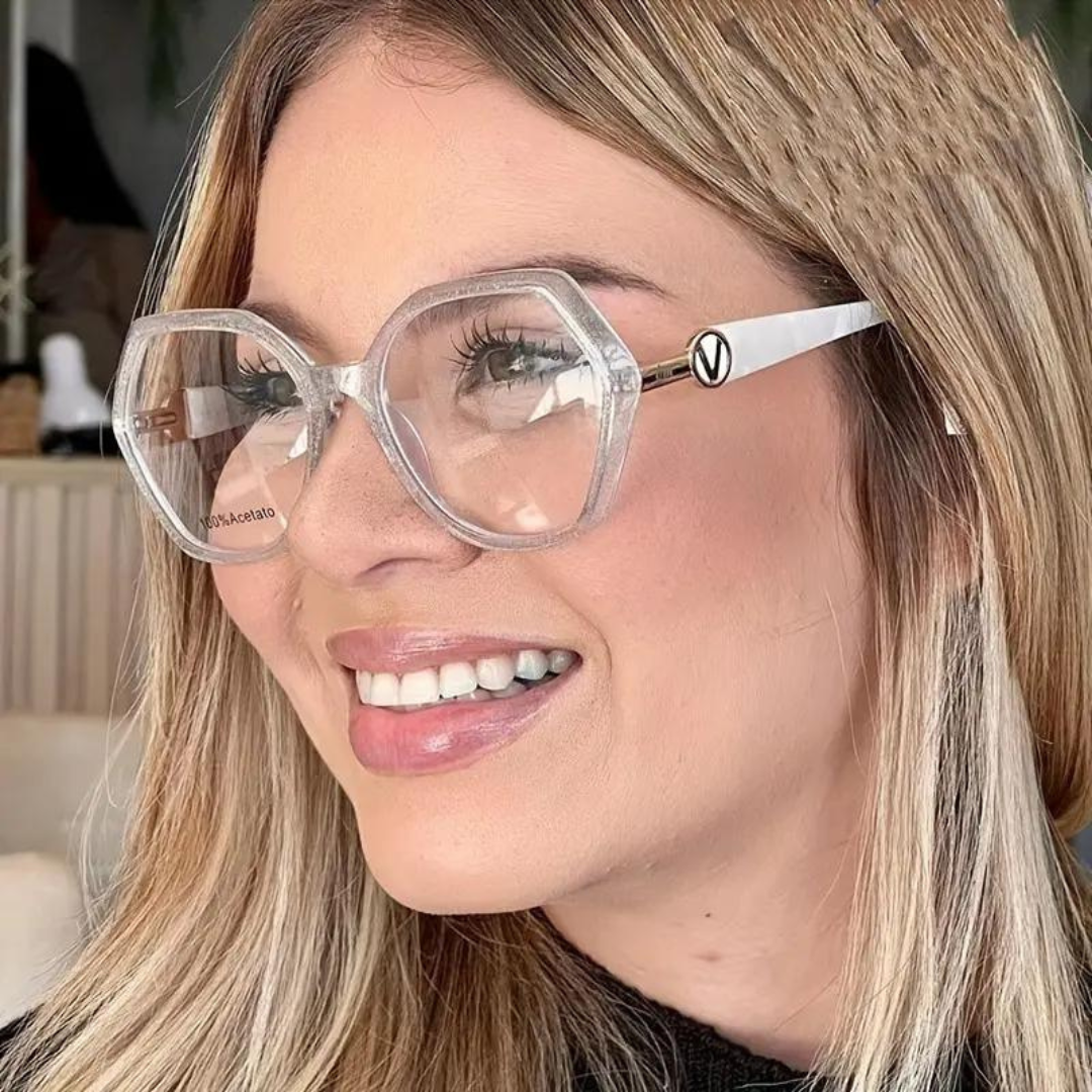 A pair of sleek transparent computer glasses with diamond-cut frames.