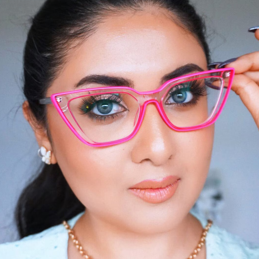 Cat eye frames in neon pink for a trendy statement.