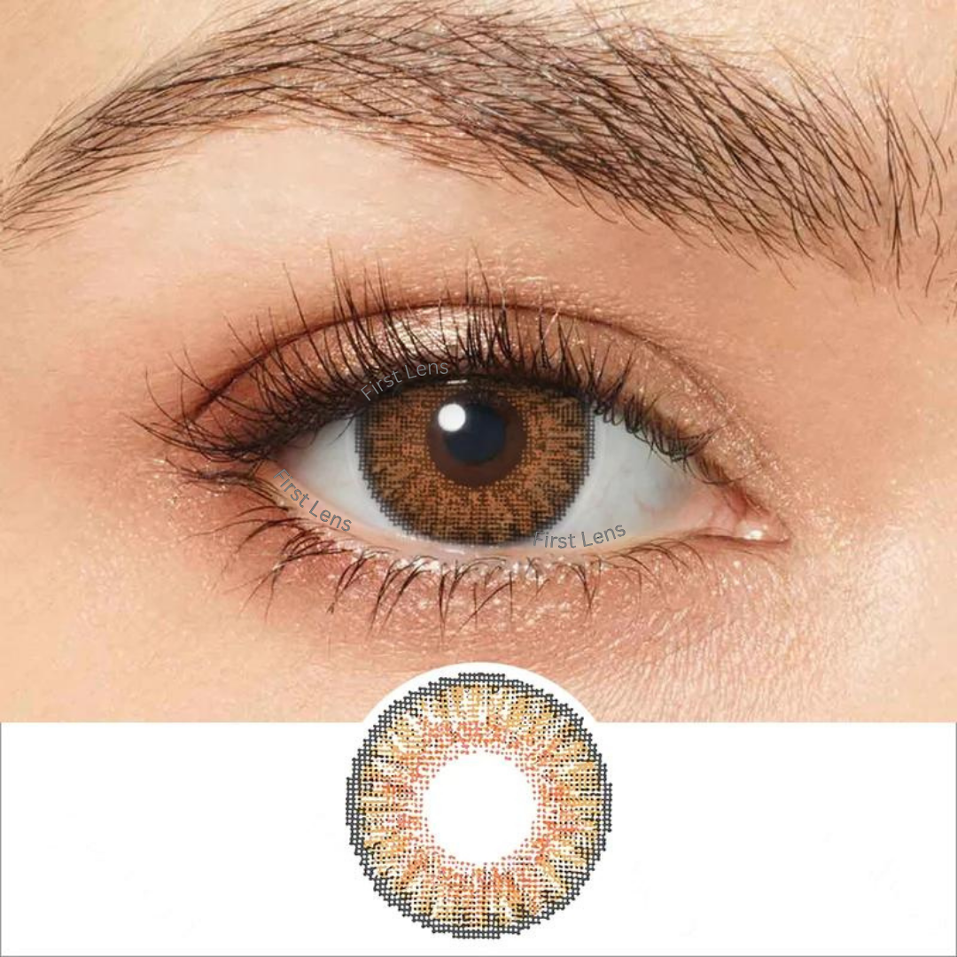 An image featuring a single Cute Honey color contact lens by First Lens in its packaging, displaying a honey-colored tint.