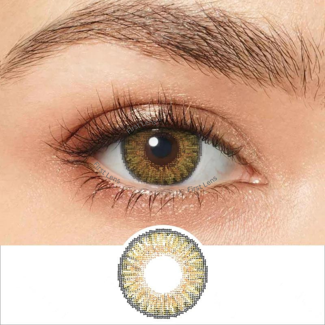 A close-up image featuring a single Livly Hazel color contact lens by First Lens, highlighting its warm hazel tones.
