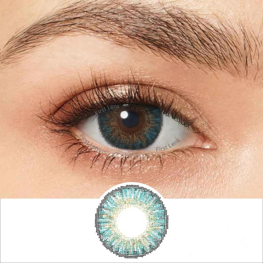An image displaying a single Trendy Turquoise color contact lens by First Lens in its packaging, featuring a vibrant turquoise shade.