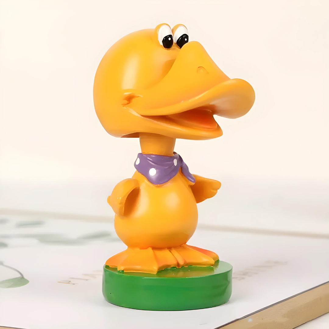 Sculpted duck figure with slots for holding glasses, offered by First Lens.
