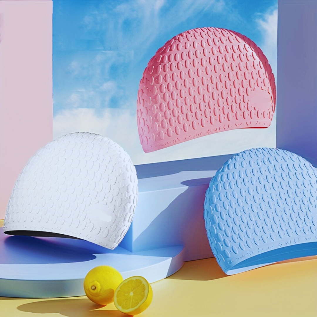 First Lens Silicone Adults Swimming Cap featuring a bubble dot pattern.