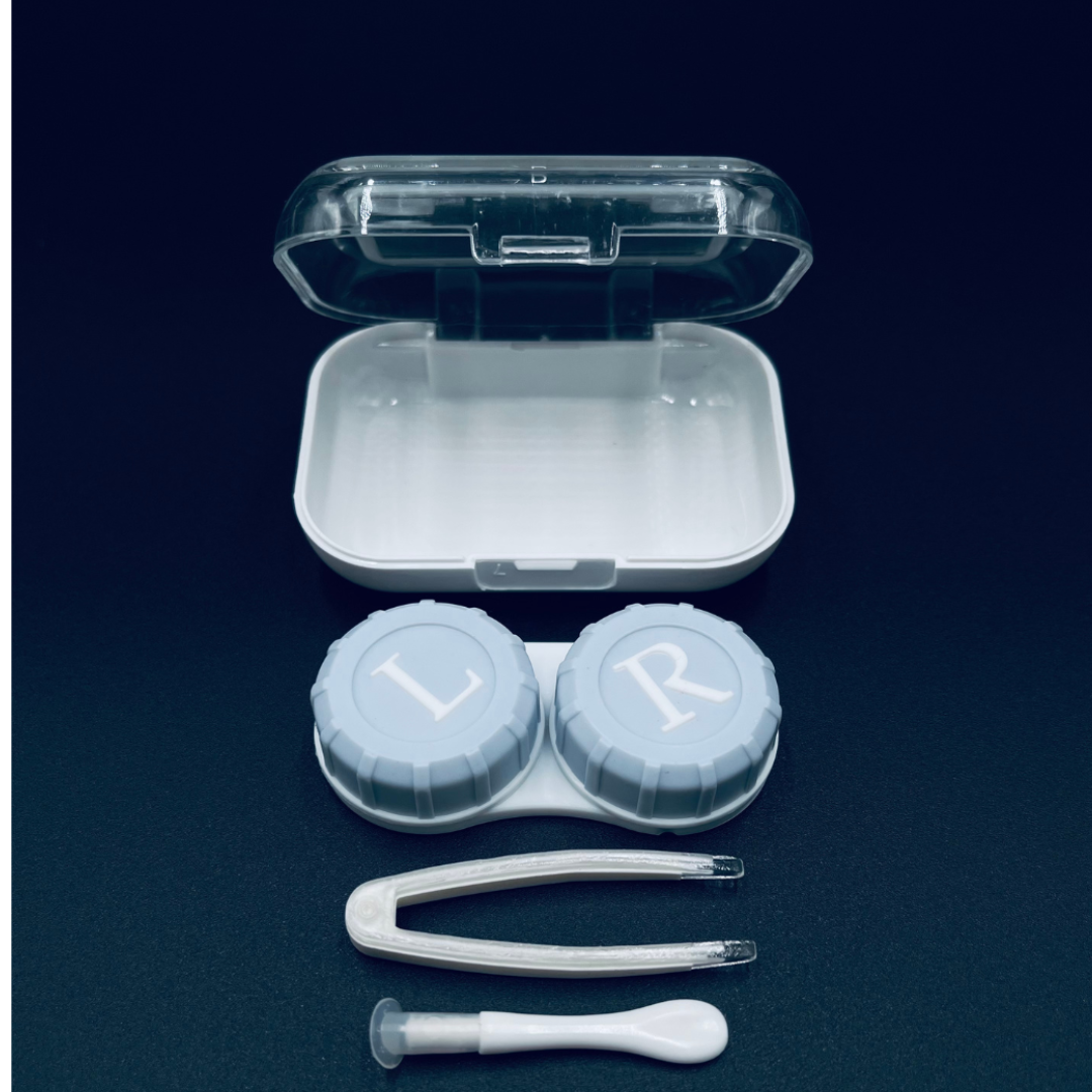 A close-up image of a First Lens Crystal Portable Contact Lens Case, featuring a transparent design with a sleek, modern look.