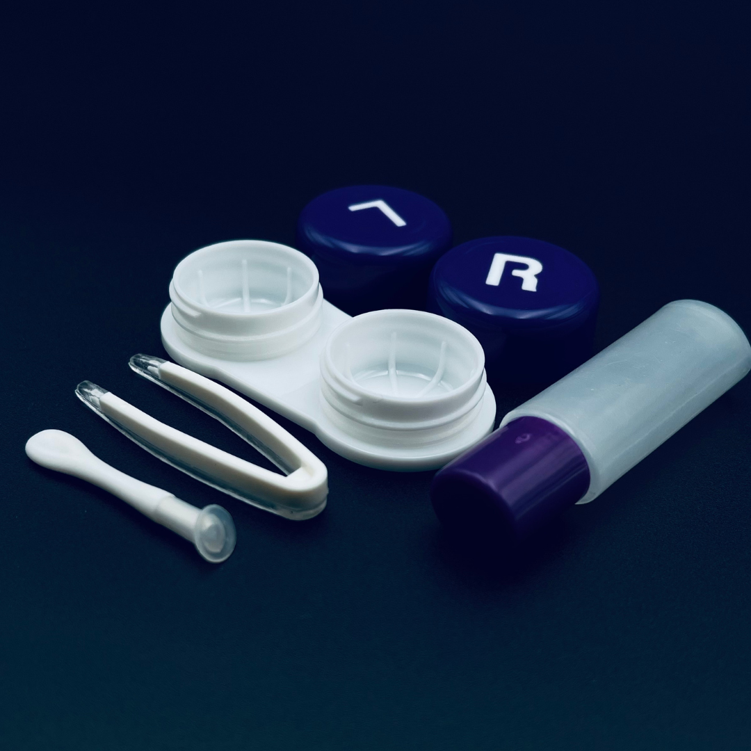 A delightful blueberry-shaped contact lens case by First Lens, a fun accessory for your eye care needs.
