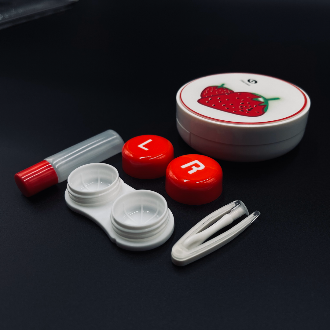 A unique orange-shaped contact lens case by First Lens, perfect for those who love citrus fruits.