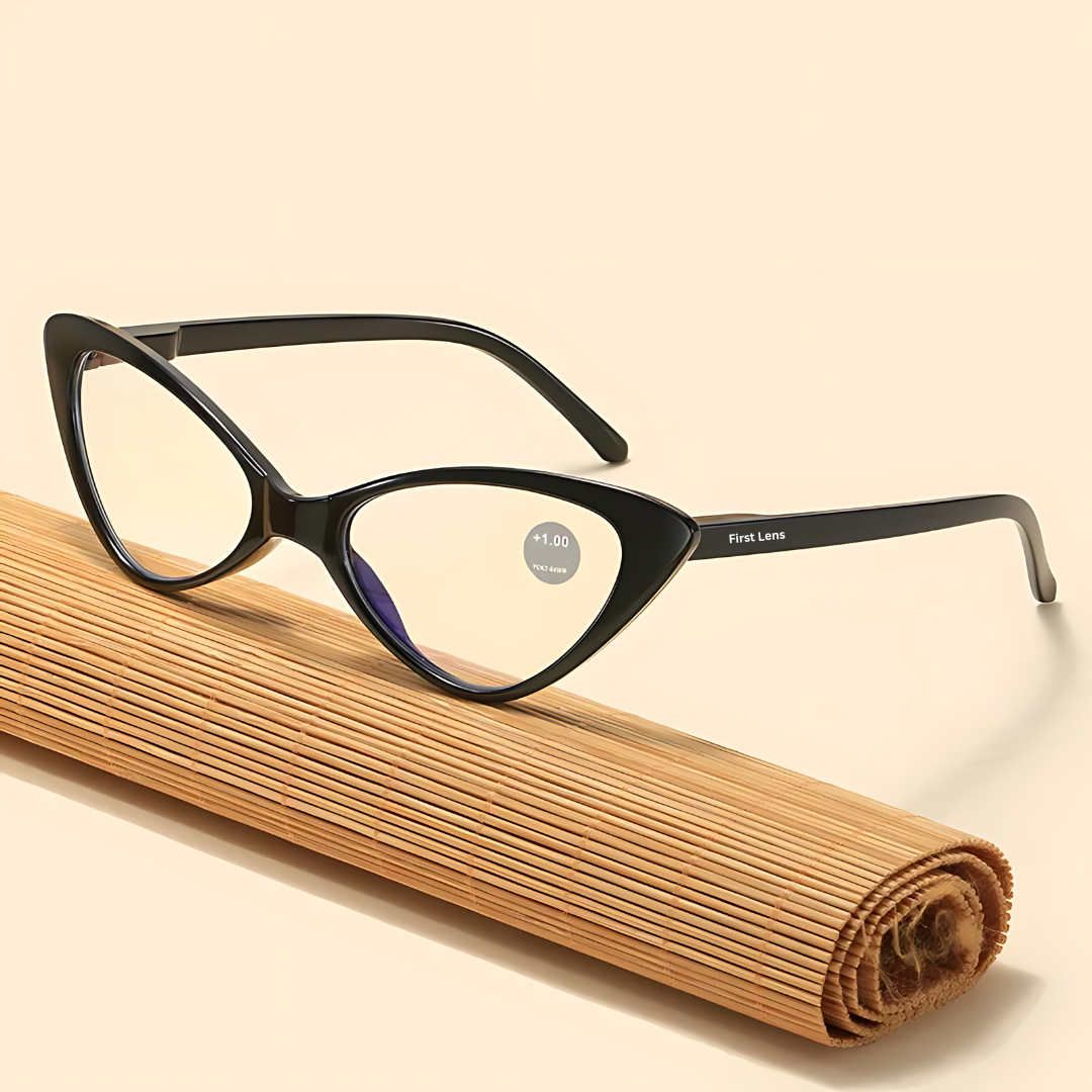 A close-up image of First Lens Full Rim Cateye Women Spectacle Reading Glasses in black, showcasing the elegant cateye frame design.
