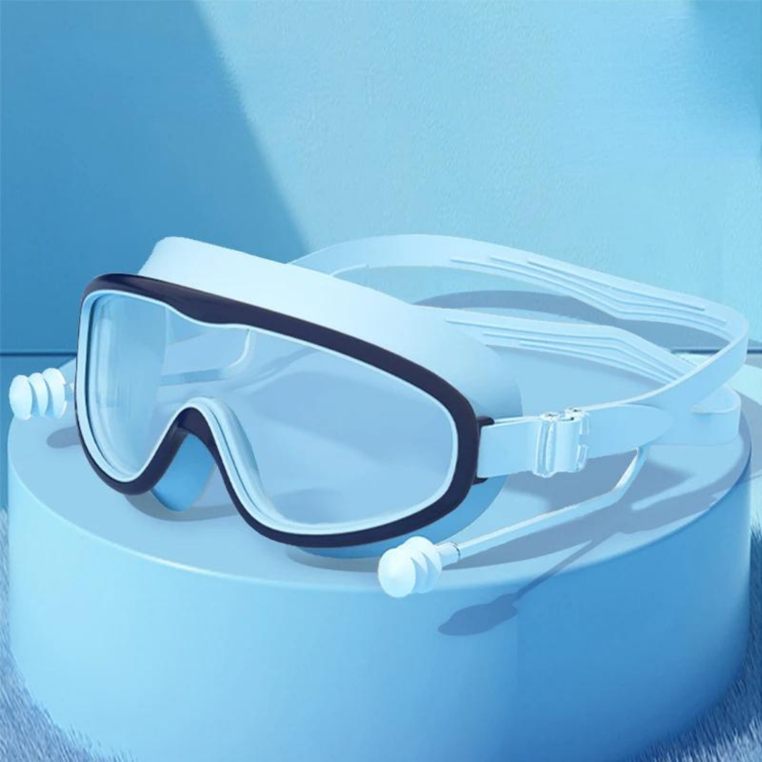 A swimmer underwater with clear vision wearing First Lens kids goggles.