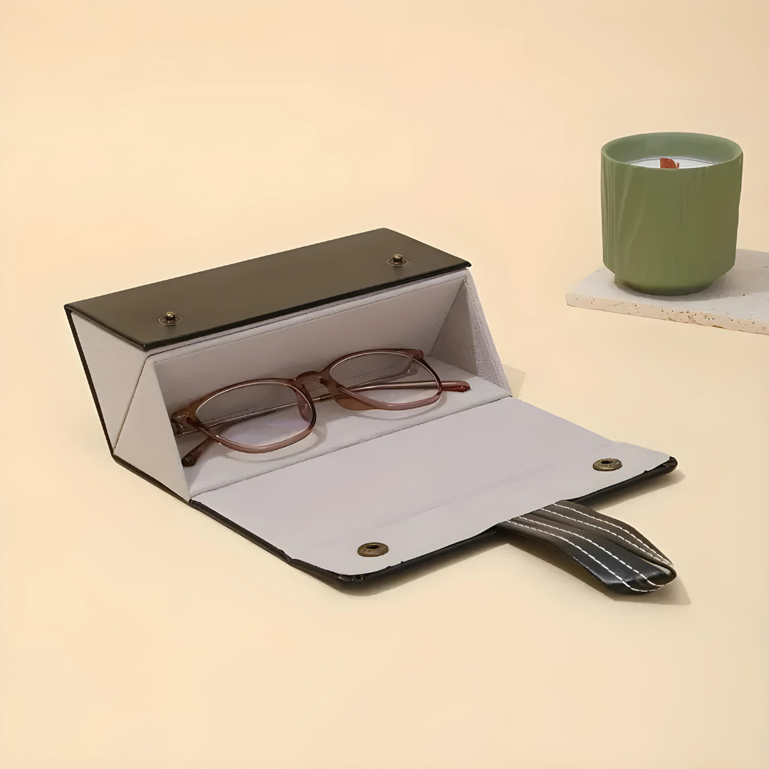 Sleek sunglass organizer by First Lens, with segmented compartments to keep your eyewear and accessories in order.