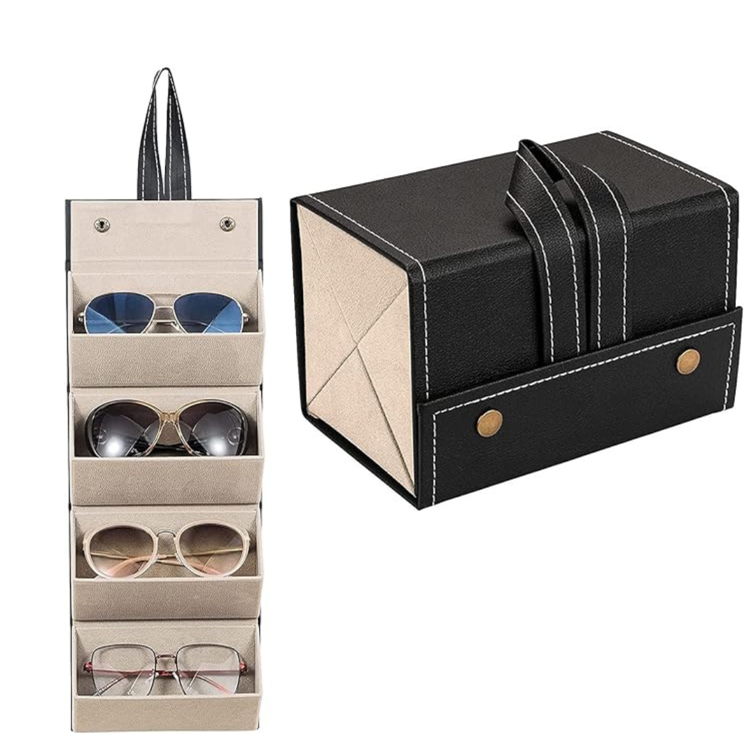 A hand opening the First Lens Locker to reveal its interior compartments filled with sunglasses.
