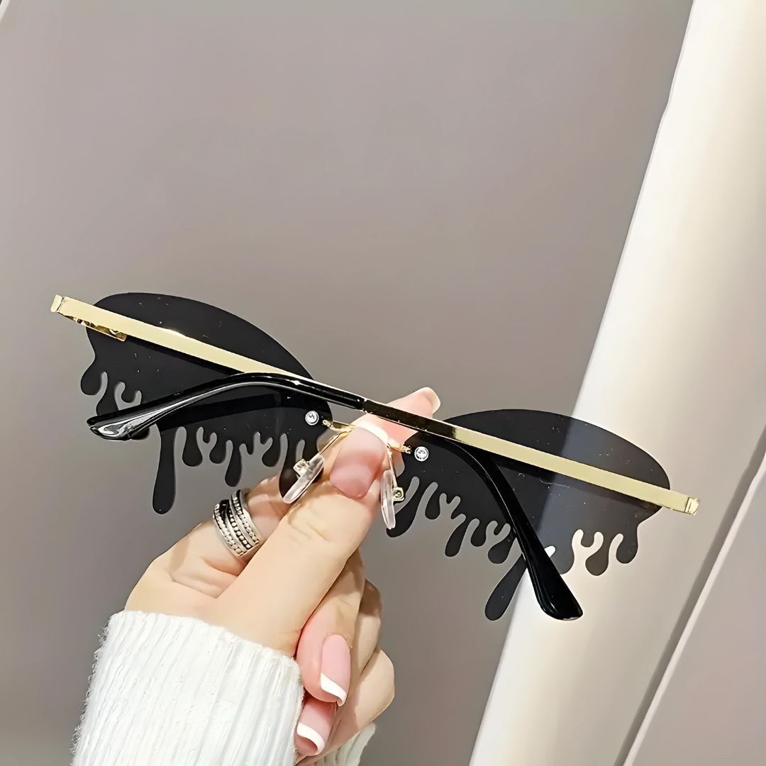 Black teardrop sunglasses with UV protection by First Lens.