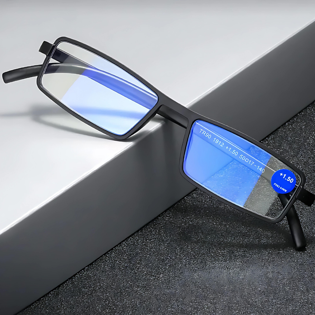 A close-up image of First Lens Ultra Light Reading Glasses in a metallic silver finish, showcasing the modern and chic design.